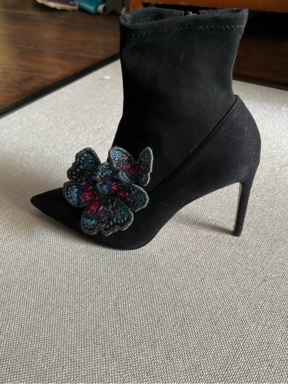 Black Suede Pointed-Toe Stiletto Ankle Boots with Embroidered Floral Accent